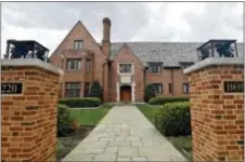  ?? ABBY DREY/CENTRE DAILY TIMES VIA AP, FILE ?? In this April 4 file photo, Penn State University’s former Beta Theta Pi fraternity house on Burrowes Road sits empty after being shut down in State College, Pa. Members of Penn State University’s now-shuttered Beta Theta Pi fraternity chapter are due...