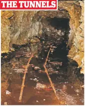  ??  ?? In the tunnels today the rails can still be seen, although the wood that once lined them has gone, showing the hewn out rock, above. Below, the authors stand in the concrete-rendered Sarin preparatio­n chamber in eastern tunnel complex, still perfectly...