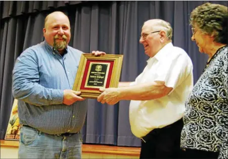  ?? LISA MITCHELL - DIGITAL FIRST MEDIA ?? Kutztown Grange presented Andy Schlegel, Kutztown, left, with the 2018 Community Citizen Award its annual Community Night on April 12. Presenting the award are Kutztown Grange Master Kenneth Dietrich and Darlene Dietrich, Lady Assistant Steward.