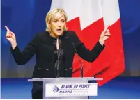  ?? (Robert Pratta/Reuters) ?? FRENCH NATIONAL Front Party leader Marine Le Pen gestures during a speech at a rally in support of her presidenti­al campaign in Lyon on Sunday.