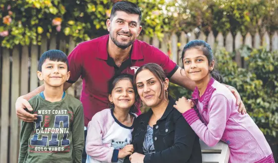  ?? Picture: Kevin Farmer ?? NEW HOME: Hazm Khudedo his wife Shazia Al Qaso and their children (from left) Lavand Khero, Rahaf Khero and Maram Khero have made a new life in Toowoomba,