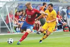  ?? Reuters ?? Czech Republic’s Jakub Jugas and Australia’s Andrew Nabbout tussle during a friendly in St Polten, Austria, on Friday.