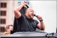  ?? Sergio Flores / Getty Images TNS ?? Extremist Alex Jones at the Texas State Capital building on April 18, 2020, in Austin, Texas.