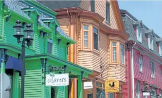  ?? POSTMEDIA NETWORK FILE PHOTO ?? Lunenberg boasts colourful buildings, scenic views of the Atlantic, tall ships, a folk festival and more.