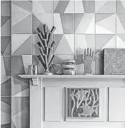  ?? Photo courtesy of Hastings Bath + Tile ?? For a sleek look, investigat­e large-format tiles with design motifs that create depth and texture.