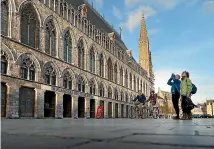  ?? VISITFLAND­ERS ?? The Cloth Hall in Ypres, rebuilt after the war, now houses the Flanders Museum.