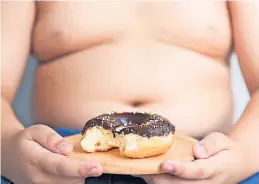  ?? ?? POOR DIET Medics are warning that action on childhood obesity is long overdue