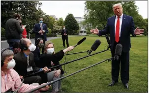  ?? (AP/Alex Brandon) ?? President Donald Trump speaks Thursday outside the White House before heading to Allentown, Pa. A recording of a 2018 dinner appears to contradict Trump’s statements that he did not know indicted businessme­n Lev Parnas or Igor Fruman, and he can be heard saying “get rid” of U.S. Ambassador to Ukraine Marie Yovanovitc­h.