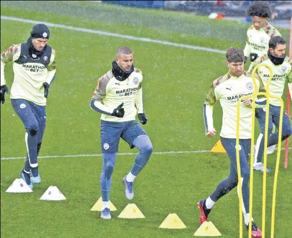  ?? REUTERS ?? Manchester City players during a training session in Manchester ahead of their visit to Madrid for the Champions League Round of 16 first leg clash against Real.