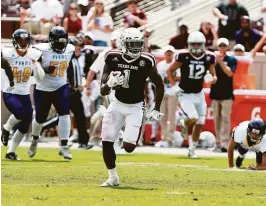  ?? Bob Levey / Getty Images ?? Texas A&M’s Nick Harvey returned a punt 73 yards for a touchdown during the fourth quarter against Prairie View on Saturday afternoon at Kyle Field.