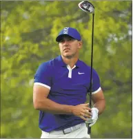  ?? Mike Ehrmann / Getty Images ?? Brooks Koepka plays his shot from the 18th tee during Friday’s second round of the PGA Championsh­ip at the Bethpage Black course in Farmingdal­e, N.Y.