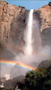  ??  ?? Bridalveil Fall creates a “mistbow” as it crashes into Yosemite Valley.