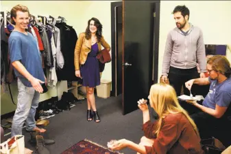  ?? Leah Millis / The Chronicle ?? Above: Noelle Viñas (center) chats with actors Brian Kennedy (clockwise from left), Feras Khagani, Kevin Glass and Madison Genovese. Left: Glass (left) and Amitis Rossoukh in “Apocalypse, Please.”