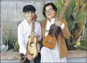  ?? Gary Coronado Los Angeles Times ?? MARTHA GONZALEZ with her musician son Sandino Gonzalez-Flores, 15, a high school freshman.