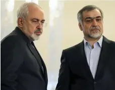  ?? Atta Kenare / AFP ?? Iranian foreign minister Javad Zarif, left, with Hossein Fereydoun, who was arrested yesterday for financial crimes