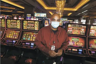  ?? Photos by Lea Suzuki / The Chronicle ?? Shanti Duroux’s wage increase at Graton casino in Rohnert Park allows him to afford taking college classes.