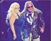  ?? Donn Jones The Associated Press file ?? Duane “Dog ” Chapman, right, and
Beth Chapman present the award for CMT performanc­e of the year at the CMT Music Awards on
June 5, 2013, in Nashville, Tenn.