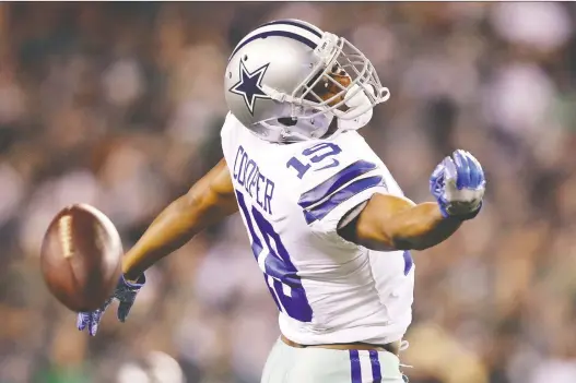  ?? PATRICK SMITH/GETTY IMAGES ?? Cowboys receiver Amari Cooper wasn’t on the field for Dallas’ last-gasp attempt on fourth-and-eight before losing 17-9 Sunday to the Philadelph­ia Eagles.