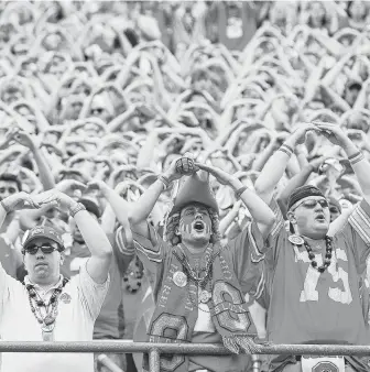  ?? Jamie Sabau / Getty Images ?? Yes, Ohio State really is trying to trademark “the” (as in THE Ohio State University). But with so many other short and commonly used words available, other programs can get in on the action, too.