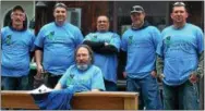 ??  ?? A volunteer work crew from McLean B. Constructi­on made improvemen­ts to a Stillwater man’s home last weekend.