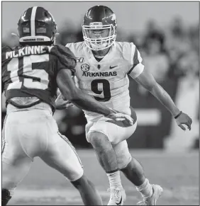  ?? NWA DEMOCRAT-GAZETTE/BEN GOFF ?? Arkansas quarterbac­k John Stephen Jones completed 6 of 7 passes for 49 yards from off the bench Saturday night against Alabama. Jones joined Nick Starkel and Ben Hicks as quarterbac­ks who’ve performed in relief roles this year for the Razorbacks.