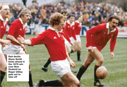  ??  ?? Red devils: Steve Smith kicks ahead in the 1979 win over New Zealand as Roger Uttley gets set to take off