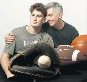  ?? Photograph­s by Mel Melcon Los Angeles Times ?? AIDAN CULLEN, 17, shown with his father, Mark, has been in almost constant pain for several years after being diagnosed with an illness said to be partly caused by his playing through injury and affliction.