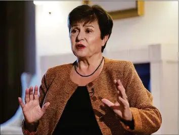  ?? Michael Sohn / Associated Press ?? Kristalina Georgieva, managing director of the Internatio­nal Monetary Fund, speaks during an interview with The Associated Press in Berlin, Germany, on Tuesday.