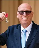  ?? ?? Ken Bruce with his MBE