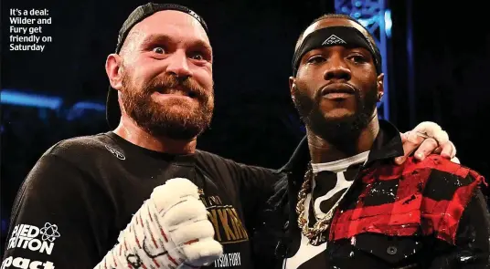  ??  ?? It’s a deal: Wilder and Fury get friendly on Saturday