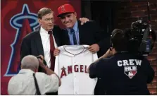  ?? RICH SCHULTZ — ASSOCIATED PRESS FILE ?? In a June 9, 2009, photo, Baseball Commission­er Bud Selig poses with Mike Trout, an outfielder from New Jersey’s Millville High School, who was picked 25th by the Los Angeles Angels in that year’s draft in Secaucus, N.J.