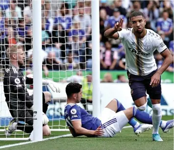  ?? ?? Double trouble: Holgate adds to Leicester’s set-piece woe and heads in for 2-1