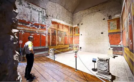  ??  ?? Lavish abode: The restoratio­n of the ancient House of augustus revealed rooms decorated with vividly coloured frescoes, many in exceptiona­l condition. — aFp photos