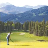  ??  ?? Head golf pro Jason Roth tees it up on the 13th tee at the Crowsnest Pass Golf Club.