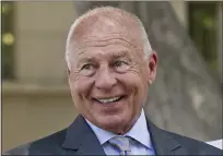  ?? DAMIAN DOVARGANES — THE ASSOCIATED PRESS FILE ?? Attorney Tom Girardi smiles outside the Los Angeles courthouse on July 9, 2014. Disbarred attorney Girardi makes his first appearance Monday.