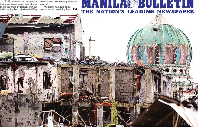  ?? (Romeo Ranoco/AFP) ?? REBUILDING MARAWI – Government assessment teams will fan out in Marawi City to determine the extent of destructio­n left by five months of intense fighting between soldiers and Islamist insurgents. The teams’ reports will help form the overall plan to...