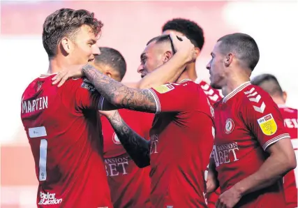  ?? Picture: Rogan Thomson ?? Bristol City players celebrate after Tommy Rowe, right, scored against Sheffield Wednesday