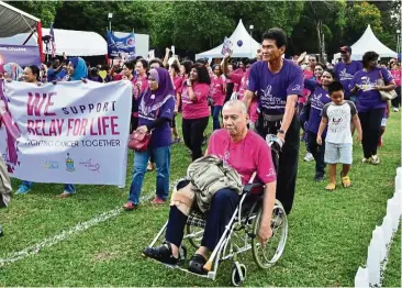  ?? — GEORGE CHEAH/The Star ?? Cancer patients, survivors and their supporters came together at a Relay For Life event in Penang in this file pic.