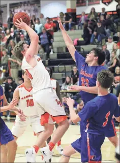  ?? Herpst / Scott ?? Lafayette’s Alex Kelehear pulls up for a shot against Northwest Whitfield last Tuesday. Kelehear had 23 points as the Ramblers rolled to a 71-53 win.