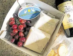  ??  ?? Le Petite Fromagerie’s full box comes with wine.