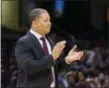  ?? SCOTT R. GALVIN — THE ASSOCIATED PRESS ?? Cavaliers head coach Tyronn Lue applauds his players as they come to the bench for a timeout during the third quarter of a preseason game against the Indiana Pacers on Oct. 8 in Cleveland.