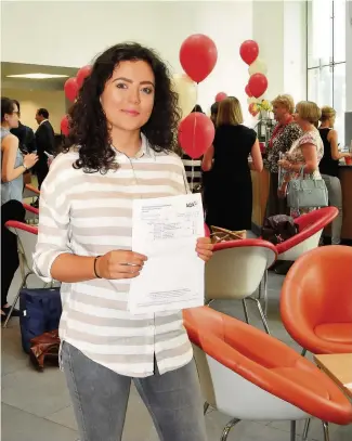  ??  ?? Grace Jenkins with her A-level results