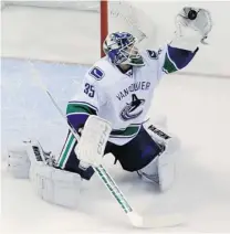  ?? JEFF ROBERSON/ THE ASSOCIATED PRESS ?? Vancouver Canucks goalie Cory Schneider, a native of Boston, carried on Tuesday by playing well for his team against the St. Louis Blues. The Canucks lost 2- 1 in a shootout.