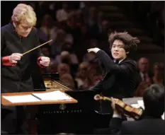  ?? RALPH LAUER — PROVIDED BY BRAVO! VAIL ?? Marin Alsop conducts the New York Philharmon­ic Orchestra with soloist Yunchan Lim on July 26 at the Bravo! Vail Music Festival.