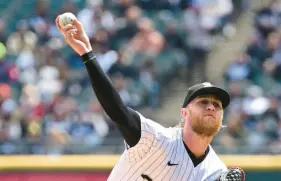  ?? ?? White Sox starter Michael Kopech delivers in the first inning Saturday against the Rays at Guaranteed Rate Field. QUINN HARRIS/GETTY