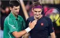  ?? Foto David Gray/AFP ?? Roger Federer (desno) je Tokio že prečrtal, Novak Đoković naj bi mu sledil.