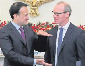  ??  ?? Taoiseach Leo Varadkar (left) with the newly appointed Tanaiste Simon Coveney