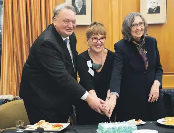  ?? SUPPLIED ?? A cake-cutting ceremony at Parliament in 2022, to mark the passing of a law giving Ngāi Tahu the right to appoint two councillor­s to Environmen­t Canterbury; then Labour MP Rino Tirakatene (left), Liz Brown of Ngāi Tahu, and Jenny Hughey of ECan.