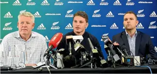  ?? PHOTO: GETTY IMAGES ?? Beauden Barrett speaks to the media after re-signing with the All Blacks and the Hurricanes. To his left is New Zealand Rugby Chief Executive Steve Tew and to his right Hurricanes Chief Executive Avan Lee.