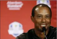  ?? MATT SLOCUM — THE ASSOCIATED PRESS ?? Tiger Woods smiles he speaks during a news conference where he was announced as a captain’s pick to the 2018 U.S. Ryder Cup Team, Tuesday in West Conshohock­en, Pa.